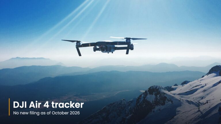 Camera drone flying above snow-covered mountains